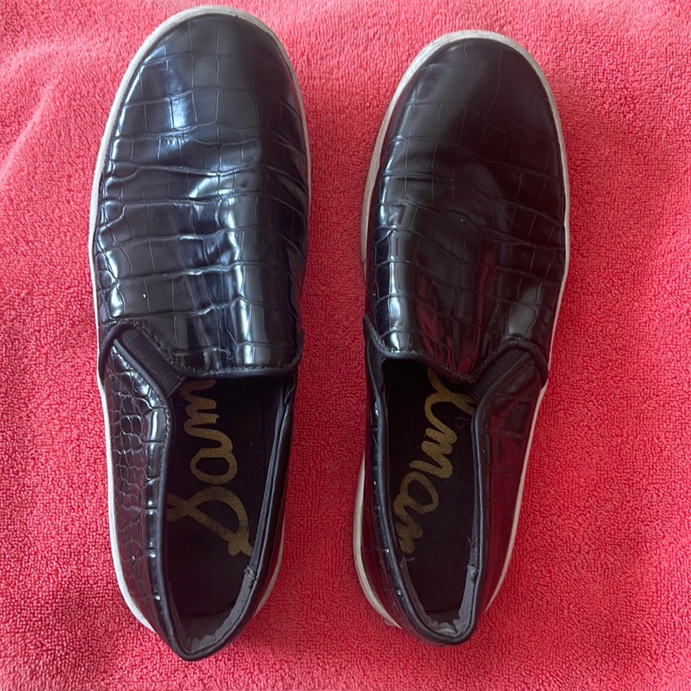 Black Sam Eldeman Slip-ons with snake skin pattern